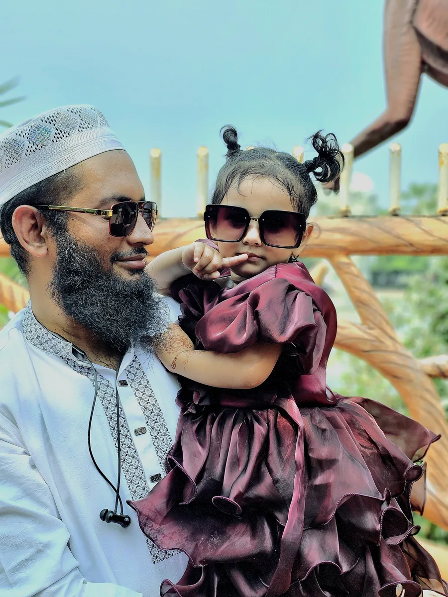 Mr. Farhan Habib holding his daughter Jannat Fariha